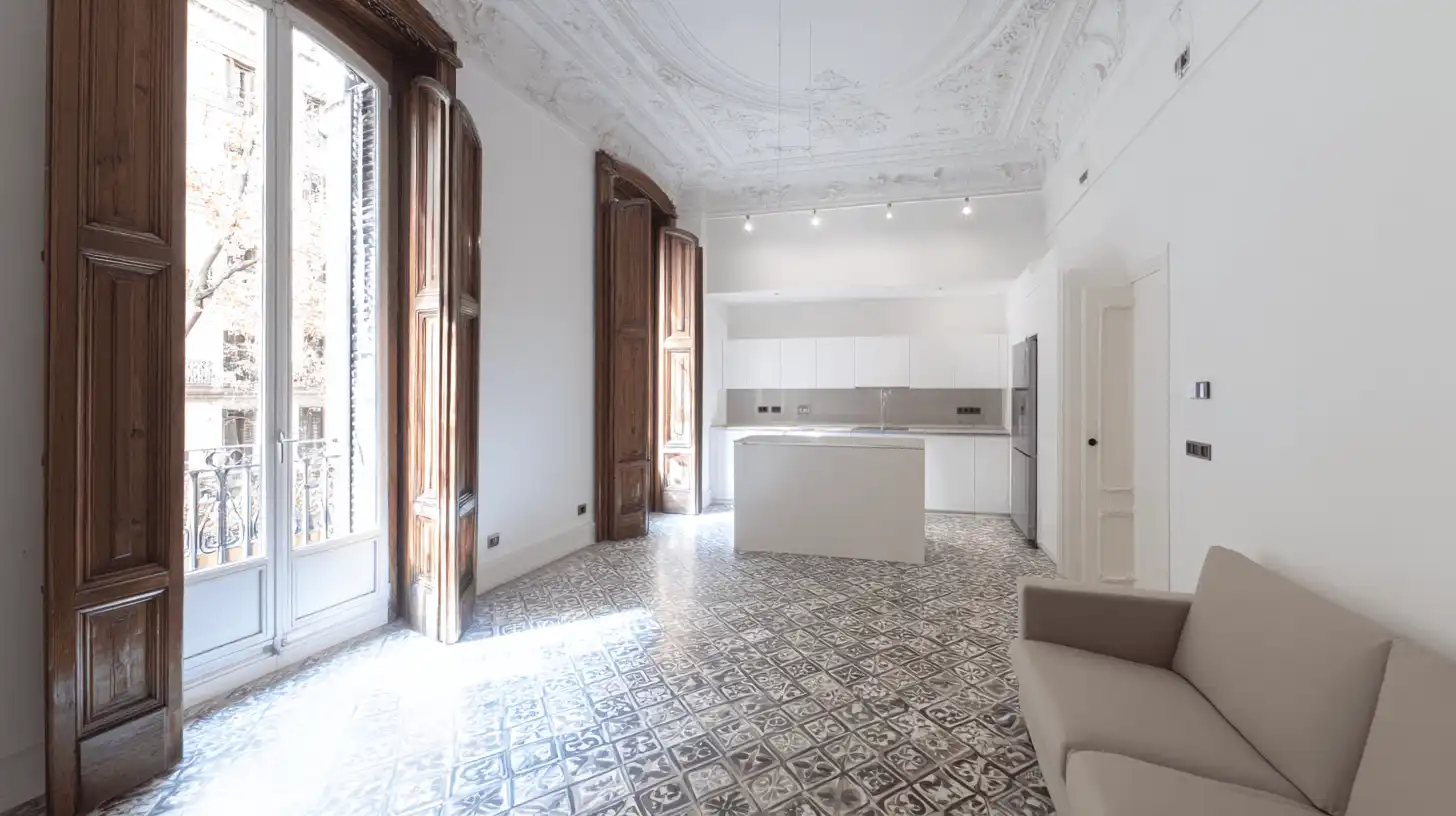 Salón de un piso modernista reformado con suelo hidráulico y cocina abierta en Sabadell
